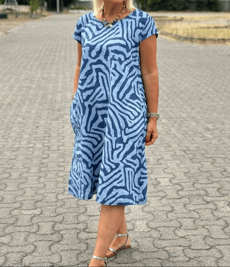 SVEA | Kleid mit Rundhalsausschnitt und wunderschönem, bauchbedeckendem Print