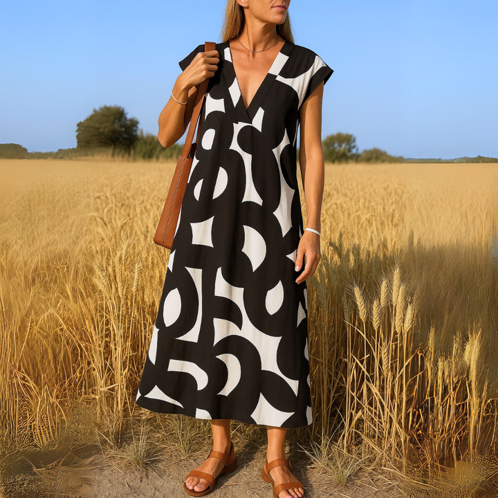 SVEA | Ibiza Style Bequemes und Fließendes Kleid mit V-Ausschnitt