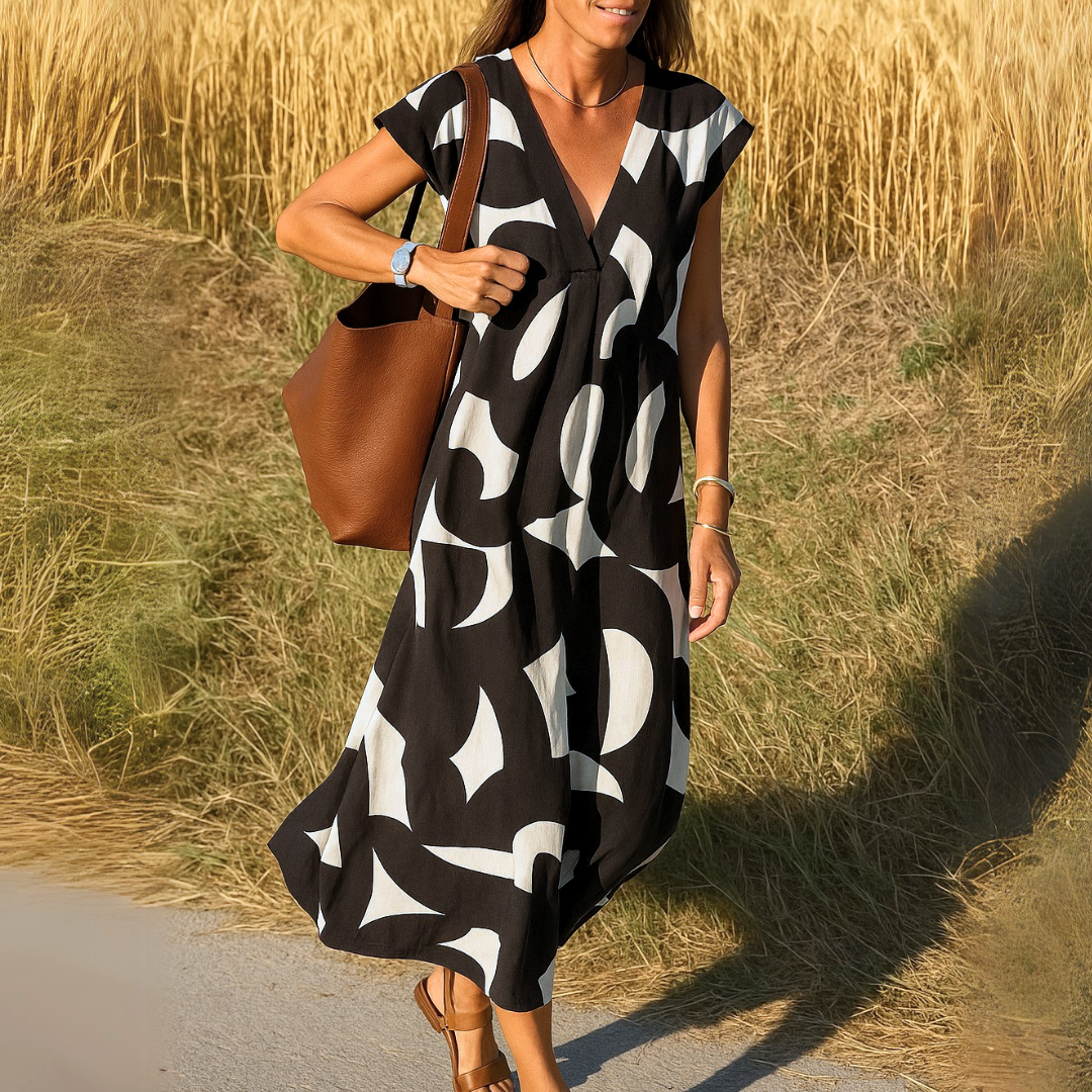 SVEA | Ibiza Style Bequemes und Fließendes Kleid mit V-Ausschnitt