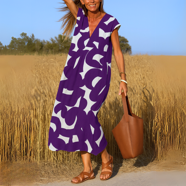 SVEA | Ibiza Style Bequemes und Fließendes Kleid mit V-Ausschnitt