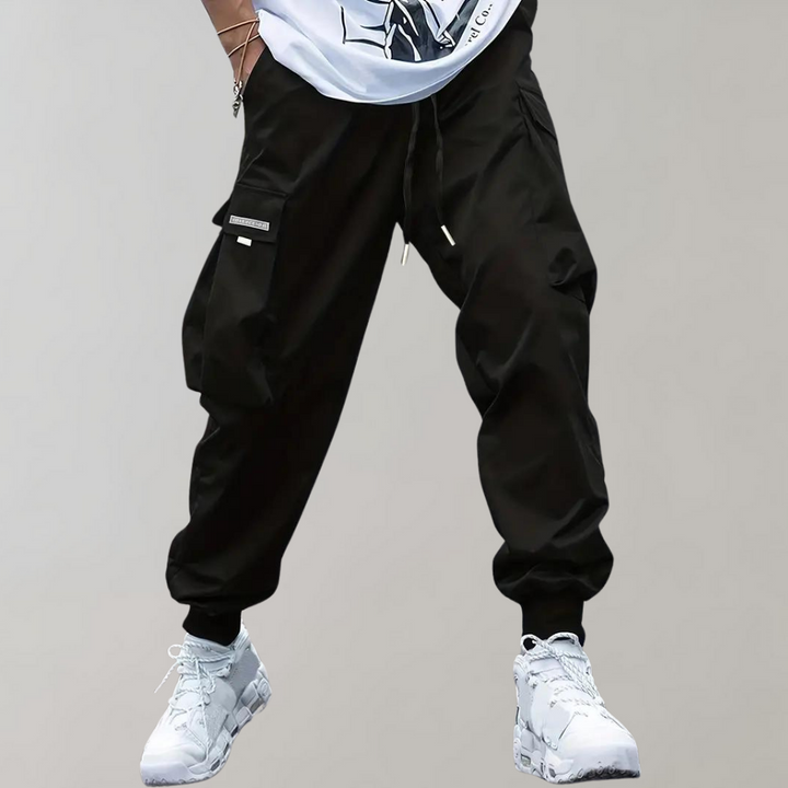 SVEA | Herren Cargo Jogginghose – Lila Streetwear-Hose mit Reißverschlusstaschen & Bündchen