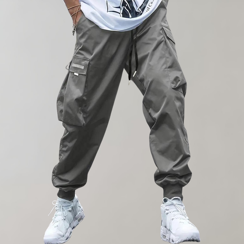 SVEA | Herren Cargo Jogginghose – Lila Streetwear-Hose mit Reißverschlusstaschen & Bündchen