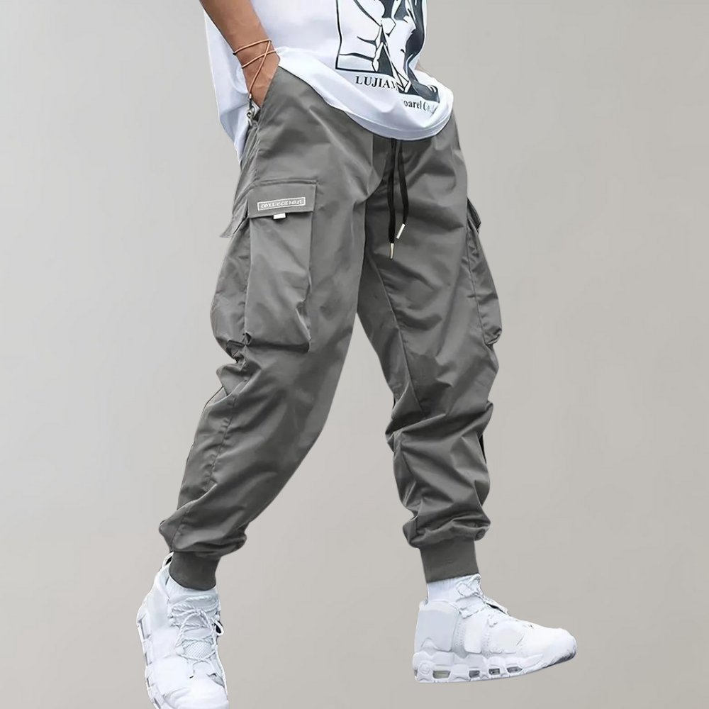 SVEA | Herren Cargo Jogginghose – Lila Streetwear-Hose mit Reißverschlusstaschen & Bündchen