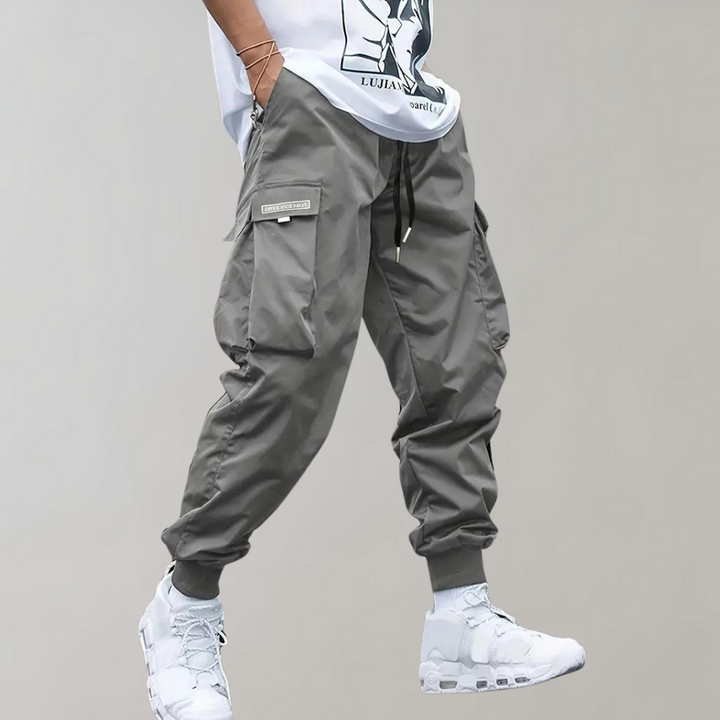 SVEA | Herren Cargo Jogginghose – Lila Streetwear-Hose mit Reißverschlusstaschen & Bündchen