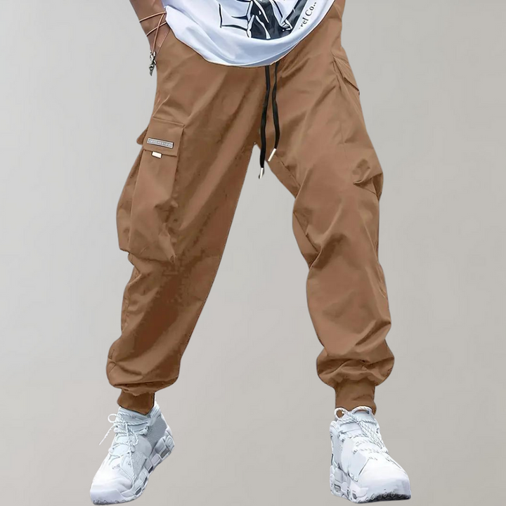 SVEA | Herren Cargo Jogginghose – Lila Streetwear-Hose mit Reißverschlusstaschen & Bündchen