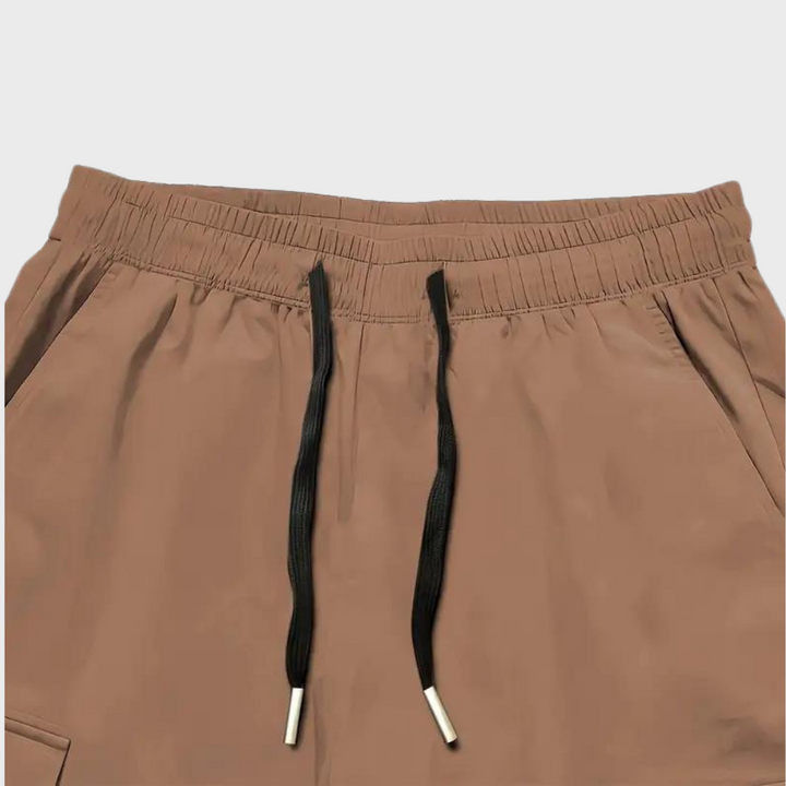 SVEA | Herren Cargo Jogginghose – Lila Streetwear-Hose mit Reißverschlusstaschen & Bündchen