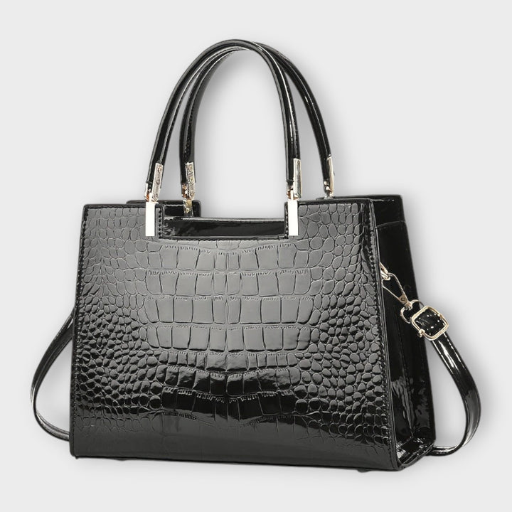 SVEA | Olivia Glänzende Handtasche mit Krokodilprägung